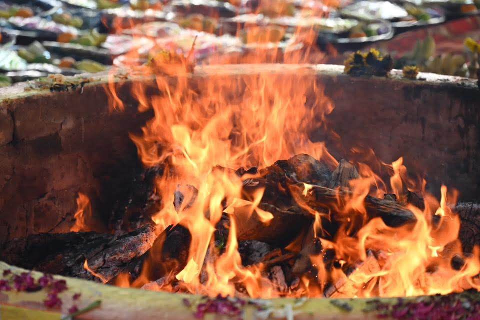 Sacred fire glowing during a homam ceremony
